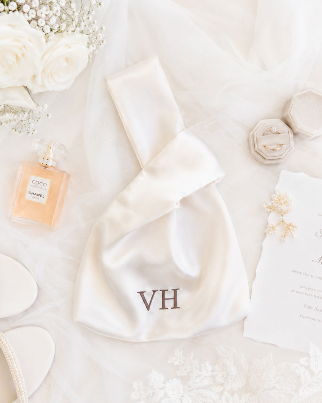The Satin Knot Clutch