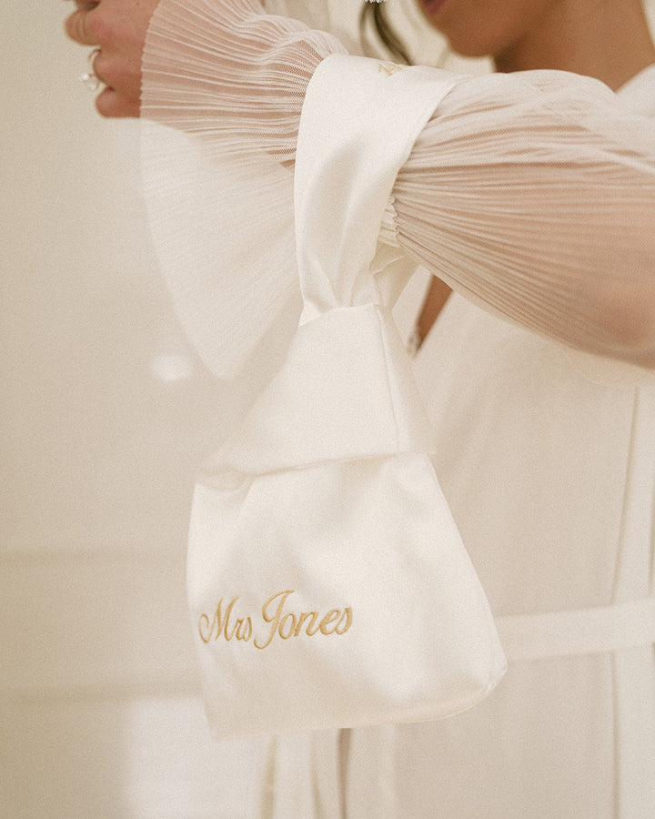 The Satin Knot Clutch