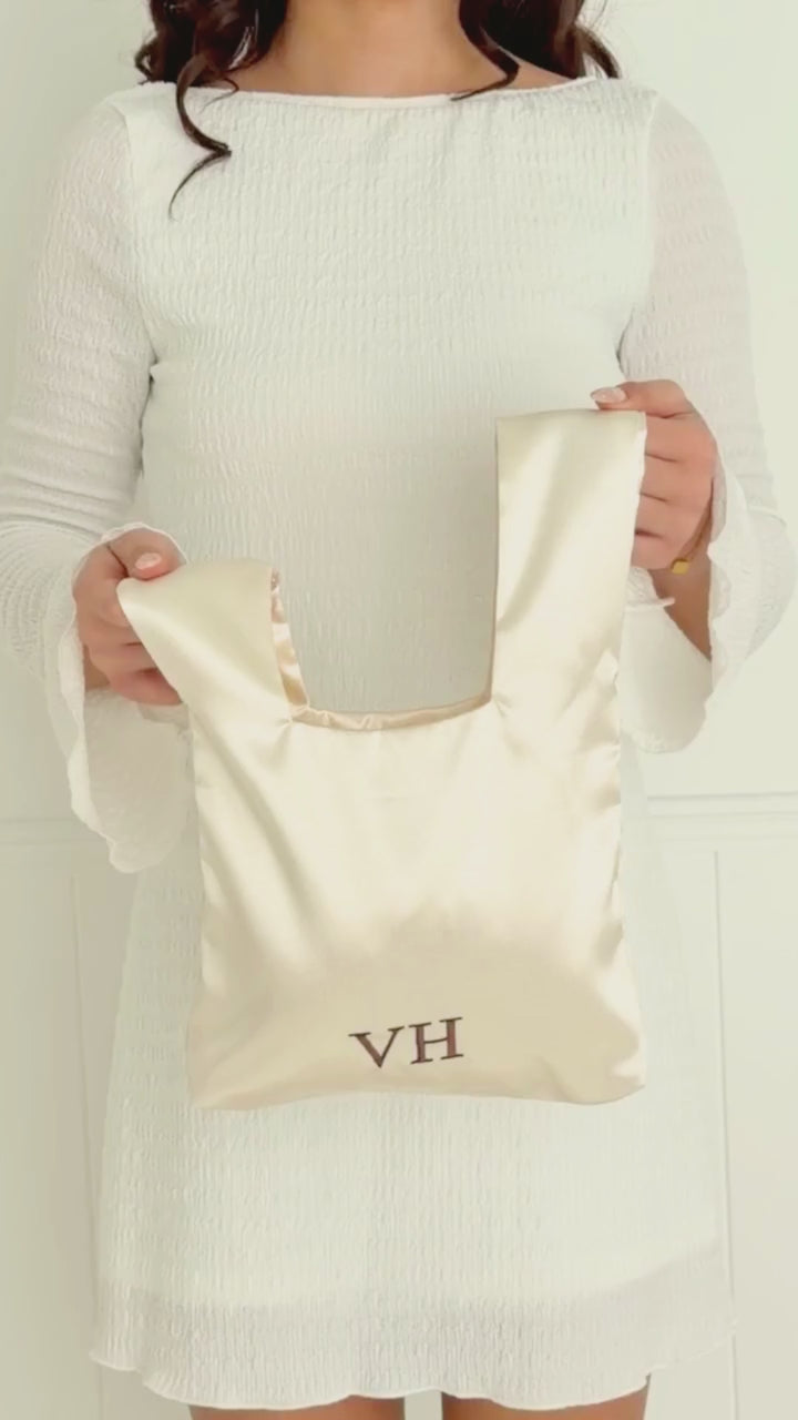 The Satin Knot Clutch